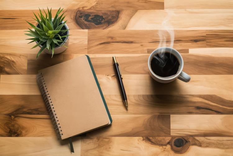 desk with notebook and cofffee